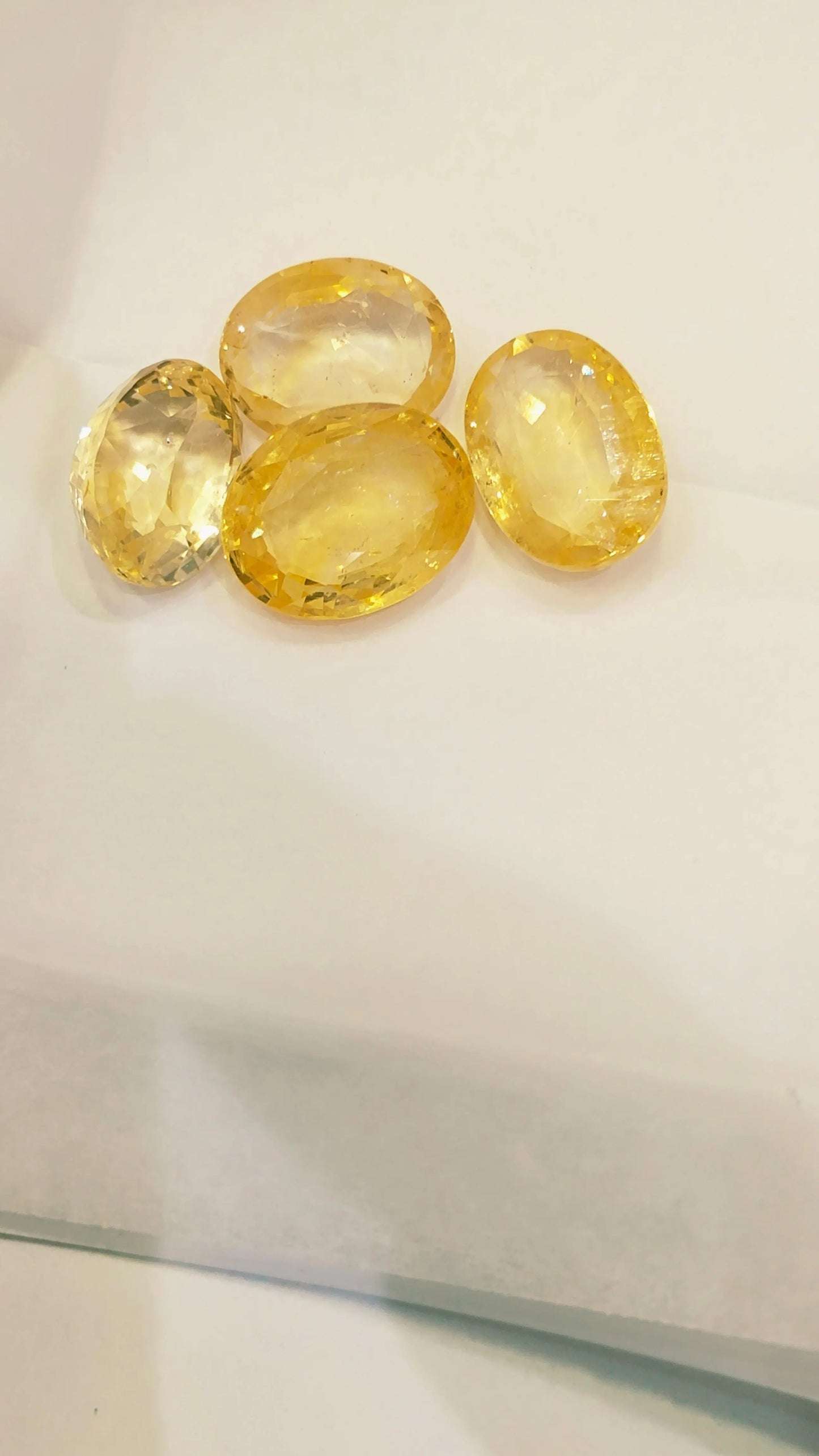 Yellow Sapphire (Pukhraj) Gemstone in Kolkata | Certified Natural Pukhraj | Sun Point Jewellers Sun point jewellers